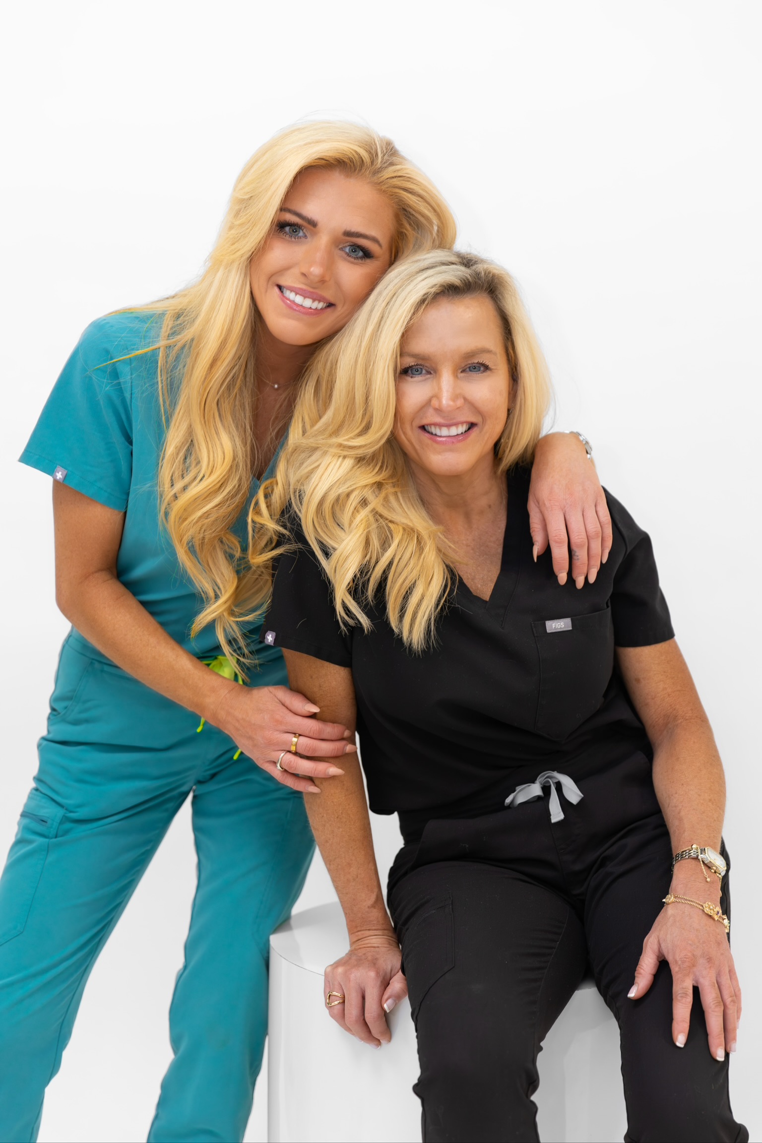 Luma clinical team members smiling in studio